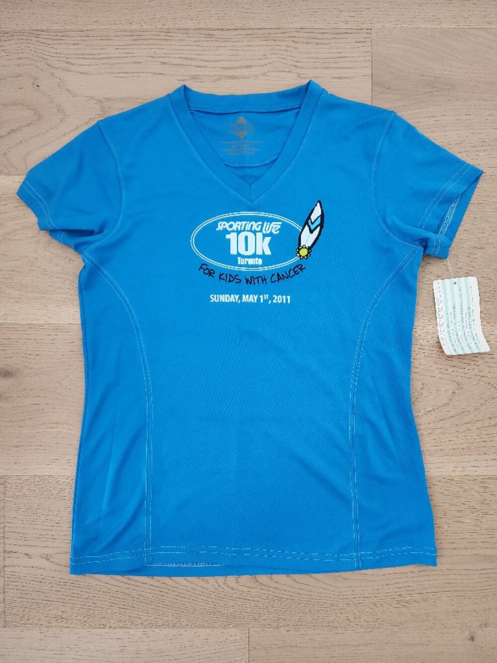 Sporting Life 10K exercise top with tags